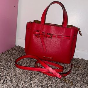 Vibrant red Michael Kors tag still attached